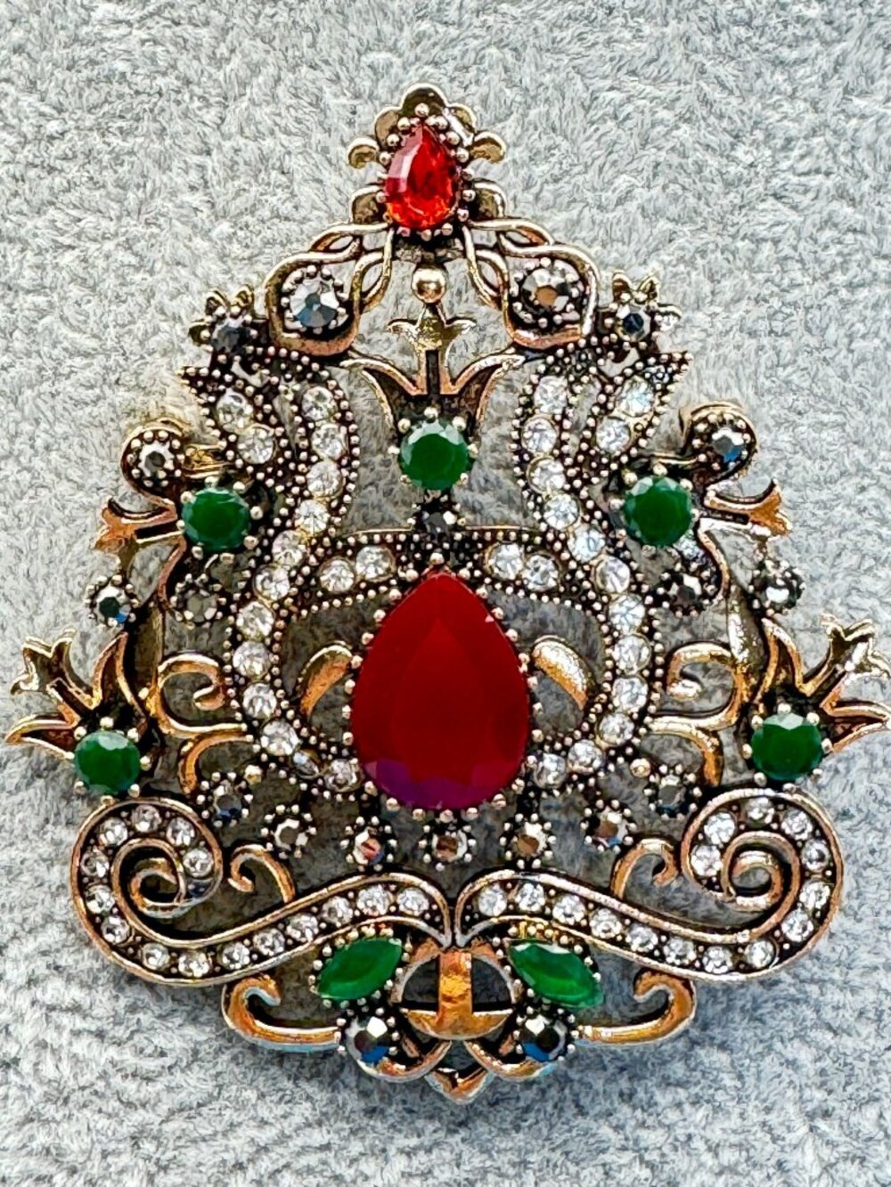 Ornate Shield Brooch Pin Red Green Clear Rhinestones Gold Tone Filigree